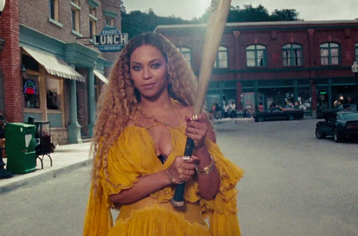 Beyonce holding a baseball bat
